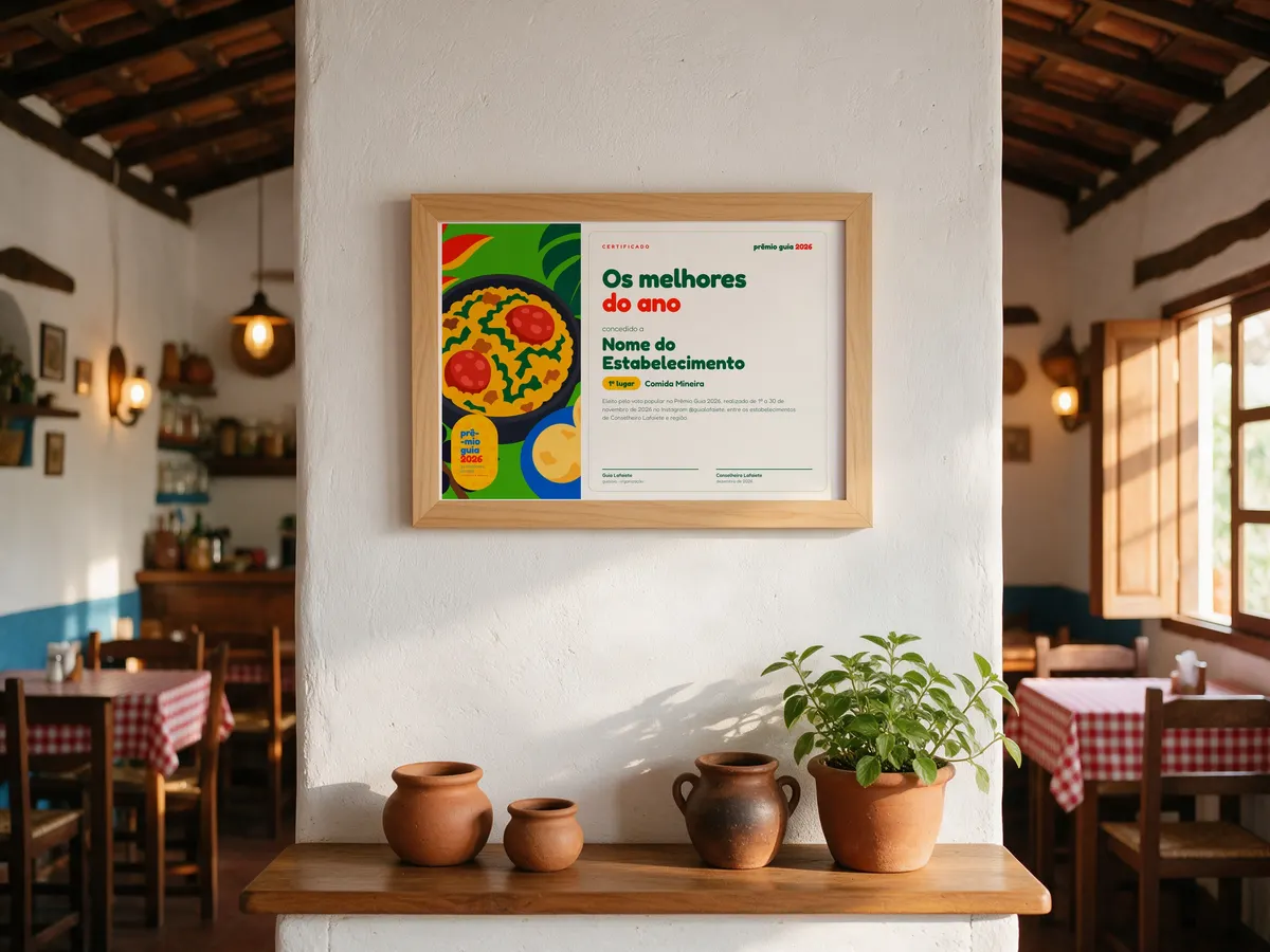 Certificado do Prêmio Guia 2026 emoldurado na parede de um restaurante